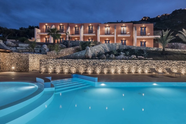 Seasonal outdoor pool, pool umbrellas, pool loungers