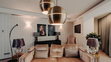 Suite, Multiple Beds (Additional Living Area) | Hypo-allergenic bedding, minibar, in-room safe, desk