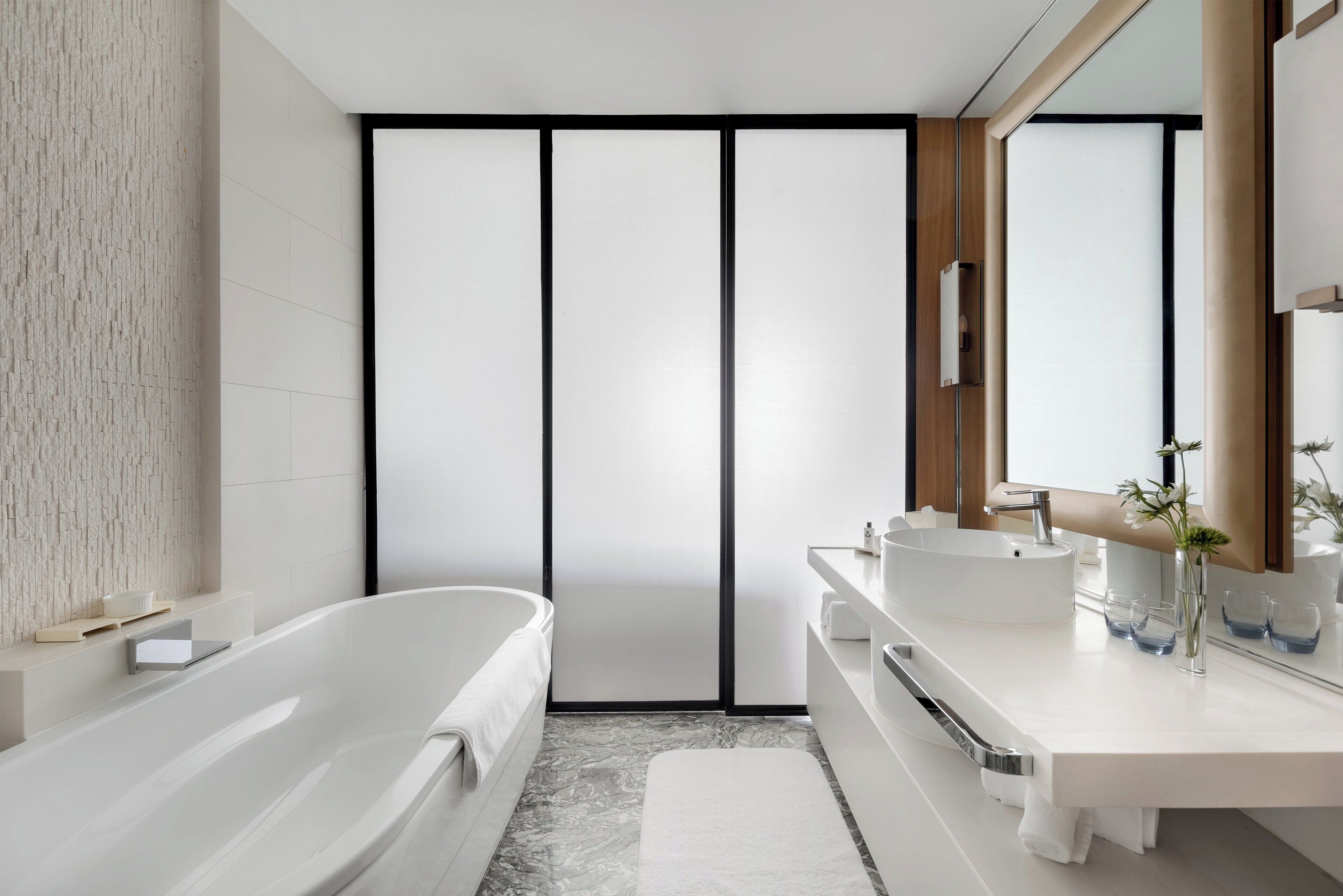 separate bathtub and shower, hair dryer, bathrobes, slippers