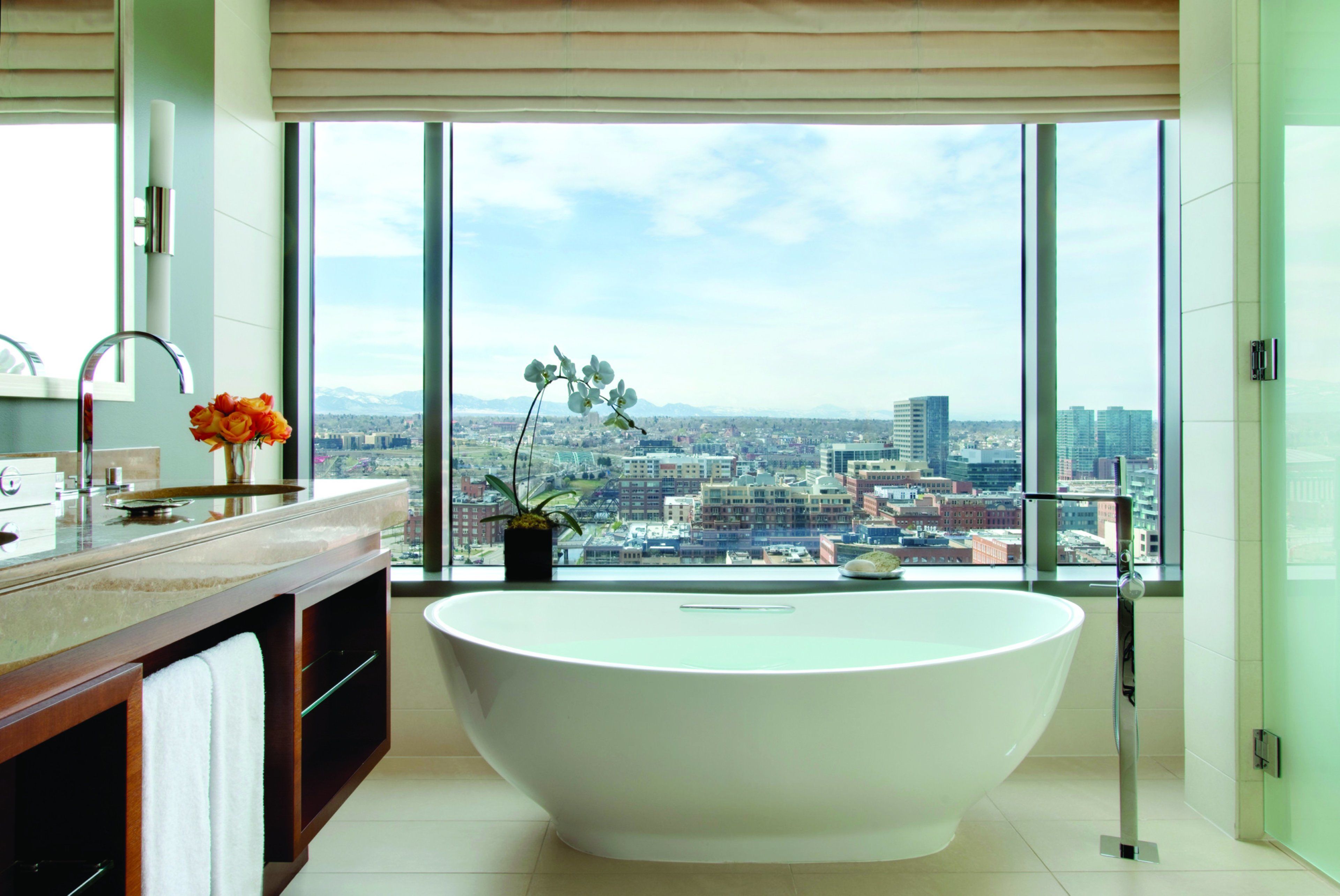 separate bathtub and shower, designer toiletries, hair dryer, bathrobes