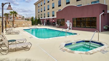 Outdoor pool, open 7:00 AM to 10:00 PM, sun loungers