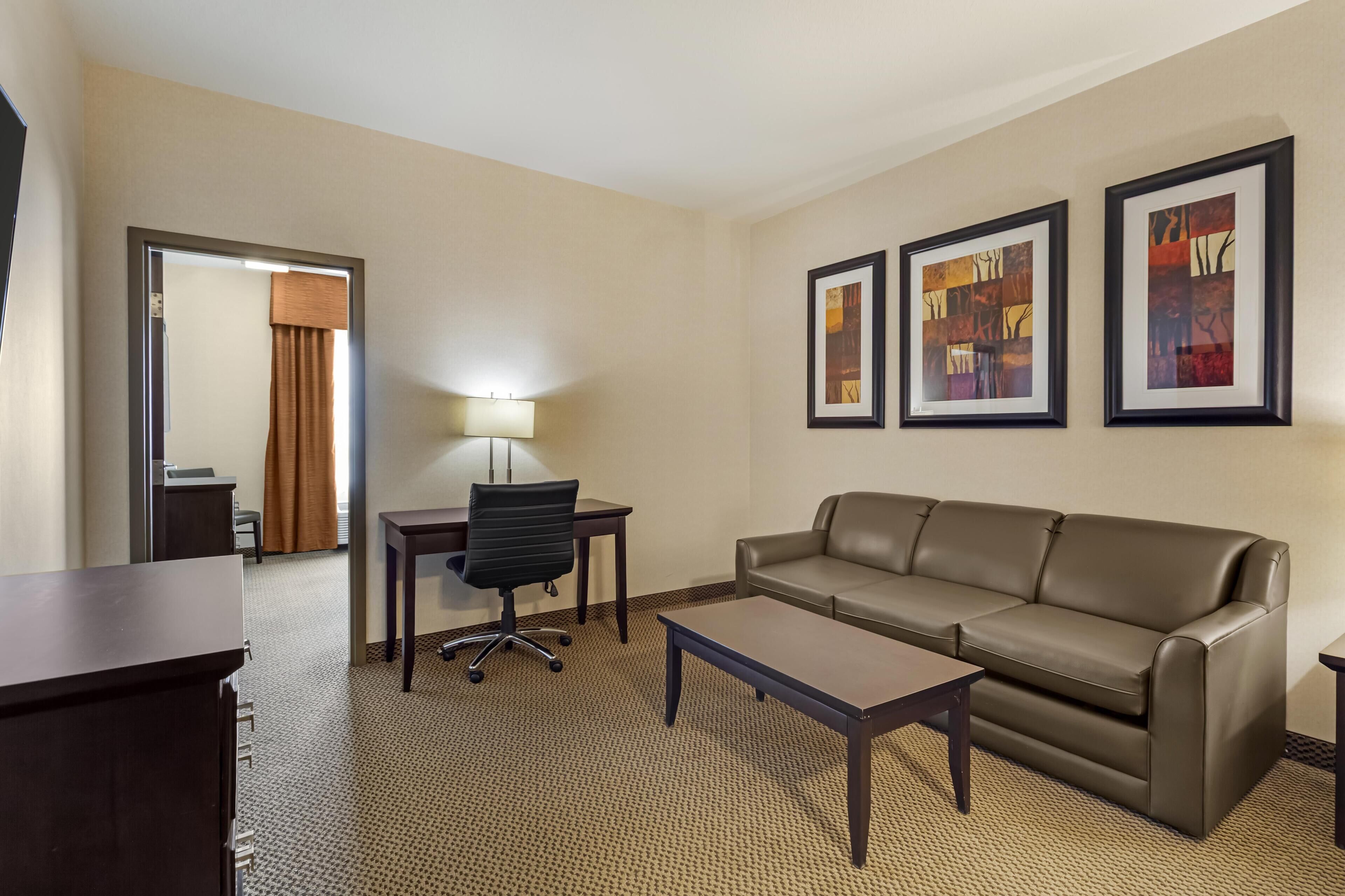 Suite, 1 King Bed, Non Smoking, Refrigerator & Microwave (Shower Only;with Sofabed) | Desk, laptop workspace, iron/ironing board, free WiFi