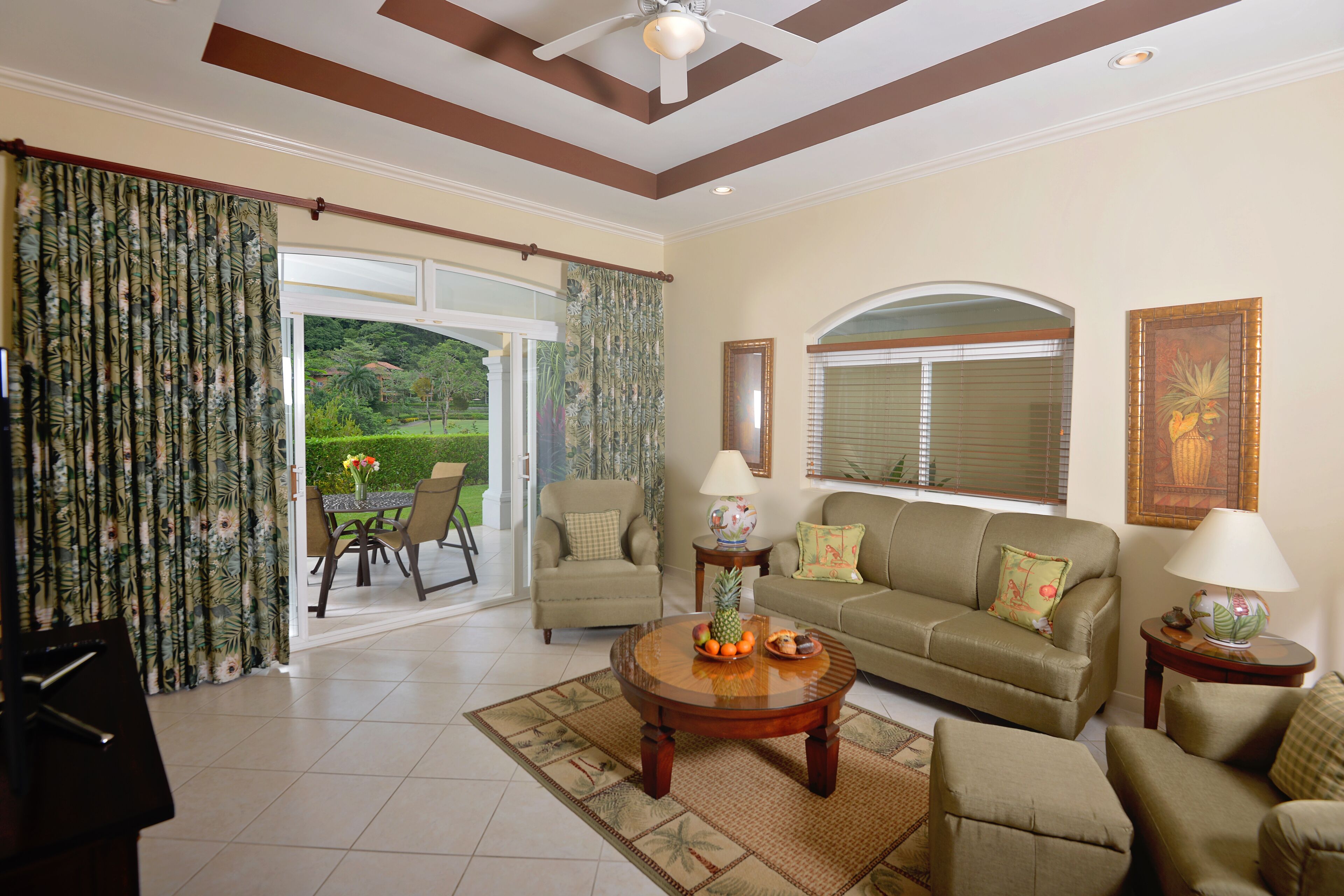 deluxe condo, 1 bedroom | living area | 32-inch tv with cable channels