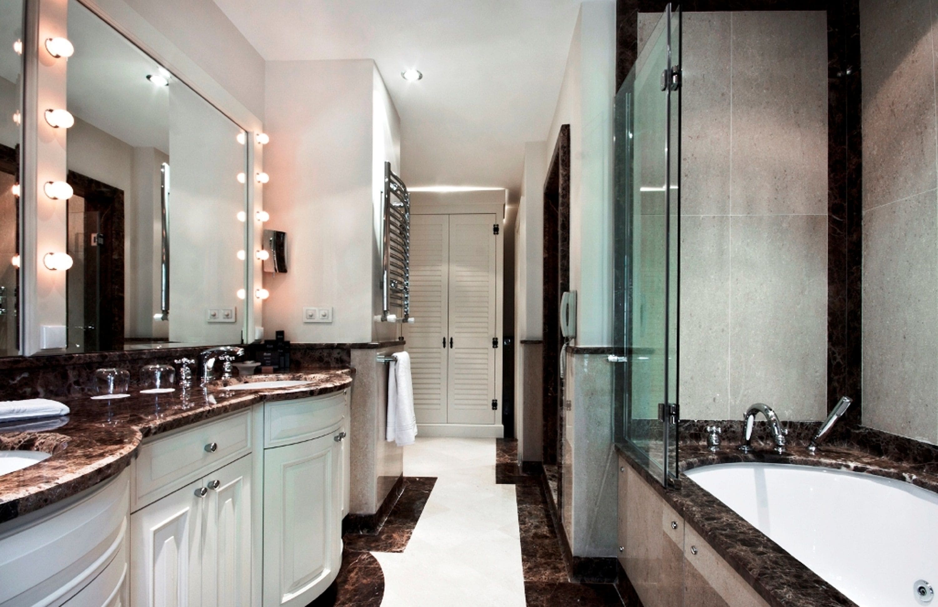 separate bathtub and shower, designer toiletries, hair dryer, bathrobes