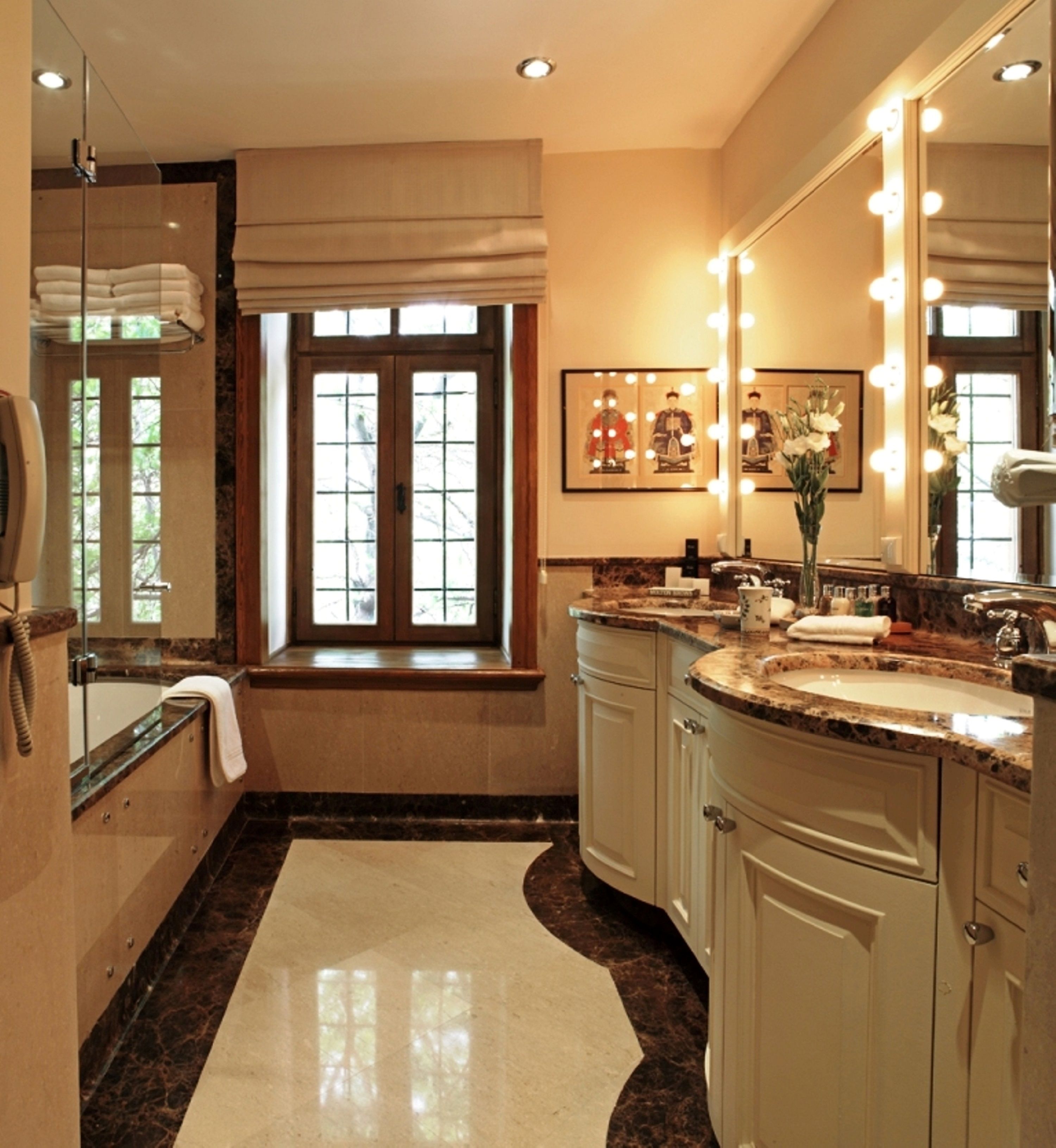 separate bathtub and shower, designer toiletries, hair dryer, bathrobes