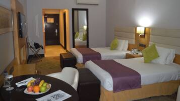 Ropa de cama de alta calidad y minibar