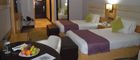 Ropa de cama de alta calidad y minibar