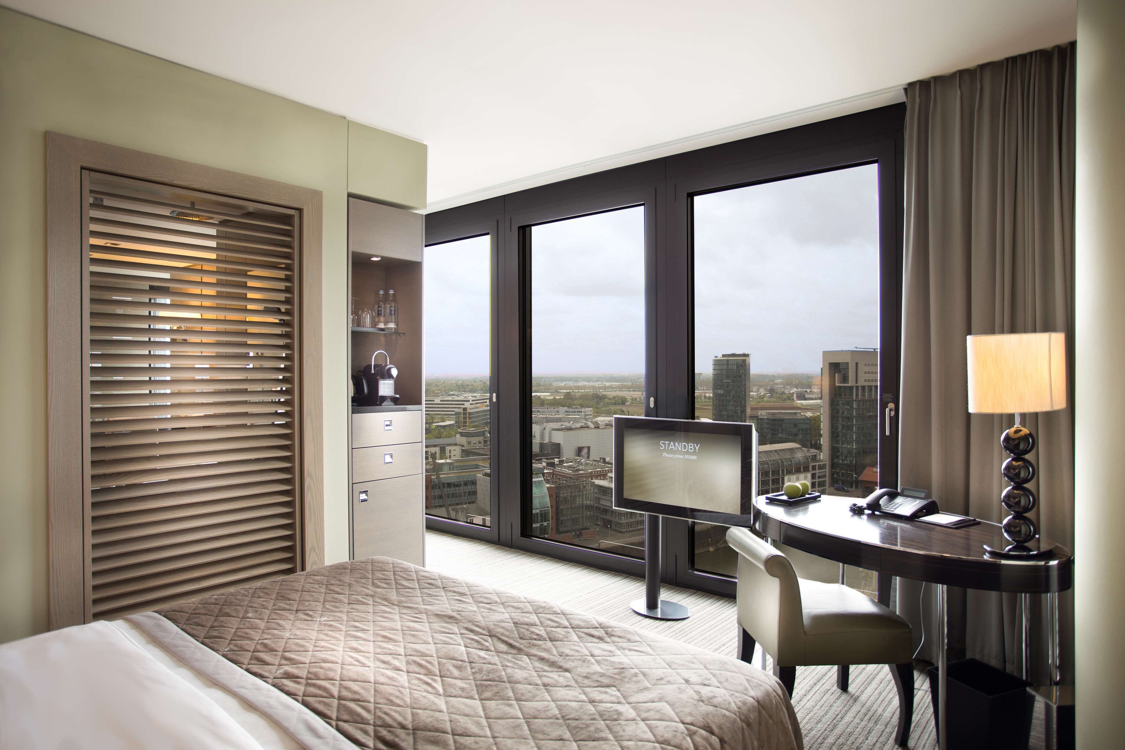 hypo-allergenic bedding, down duvets, in-room safe, desk