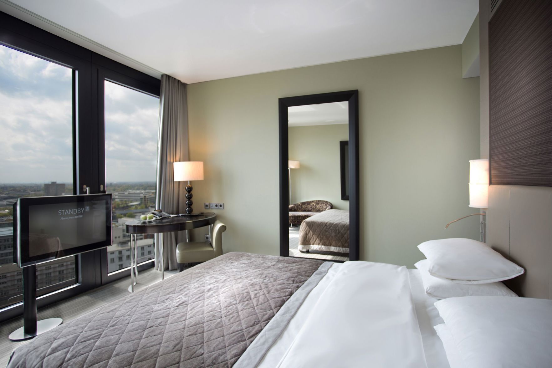Hypo-allergenic bedding, down duvets, in-room safe, desk