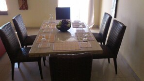 Full-size fridge, microwave, stovetop, coffee/tea maker