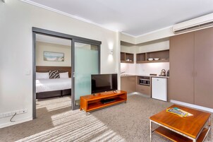 New Haus Suite With Balcony | Living area | 43-inch Smart TV with digital channels, TV