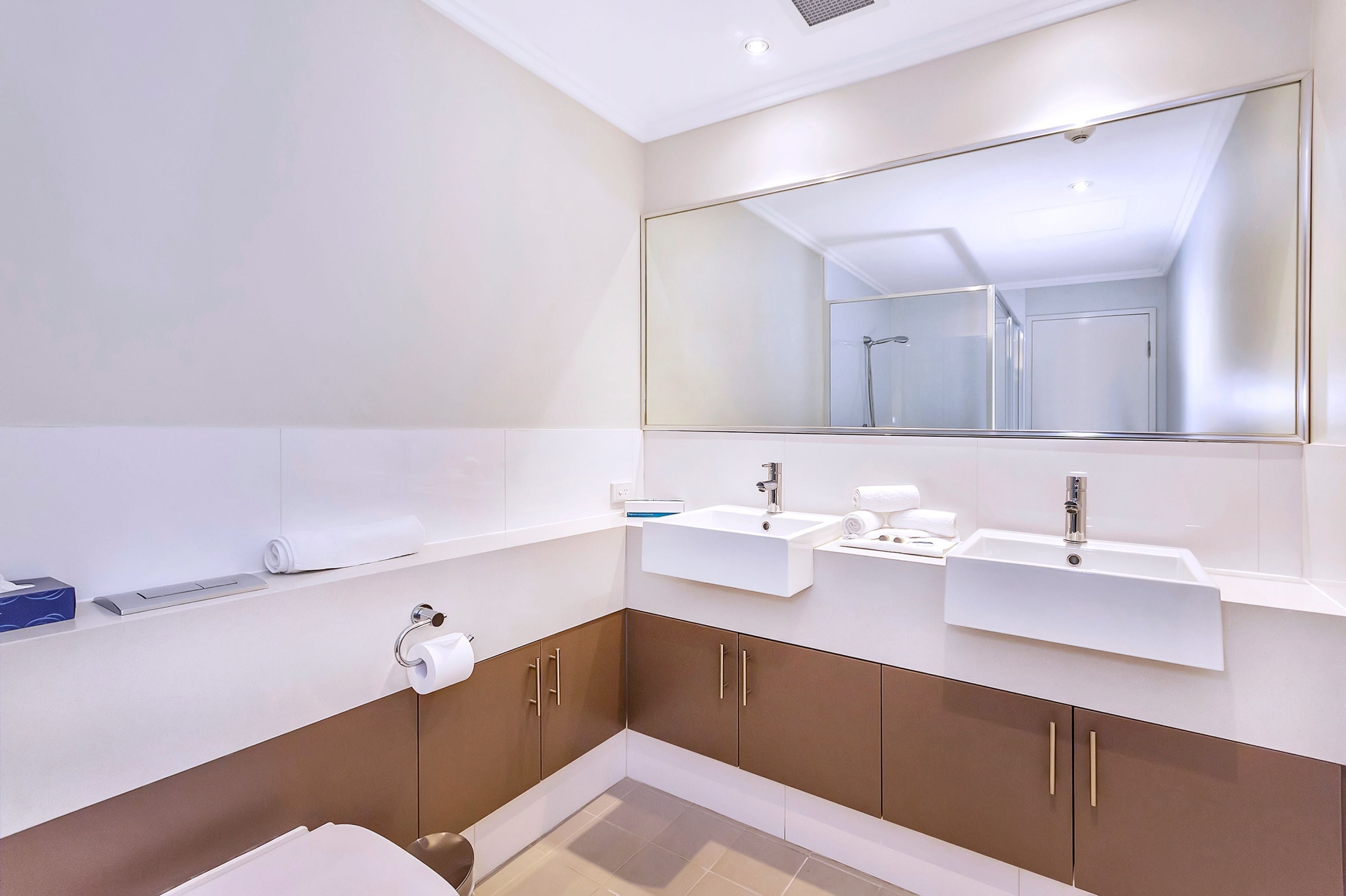 new haus studio | bathroom | shower, designer toiletries, hair dryer, towels
