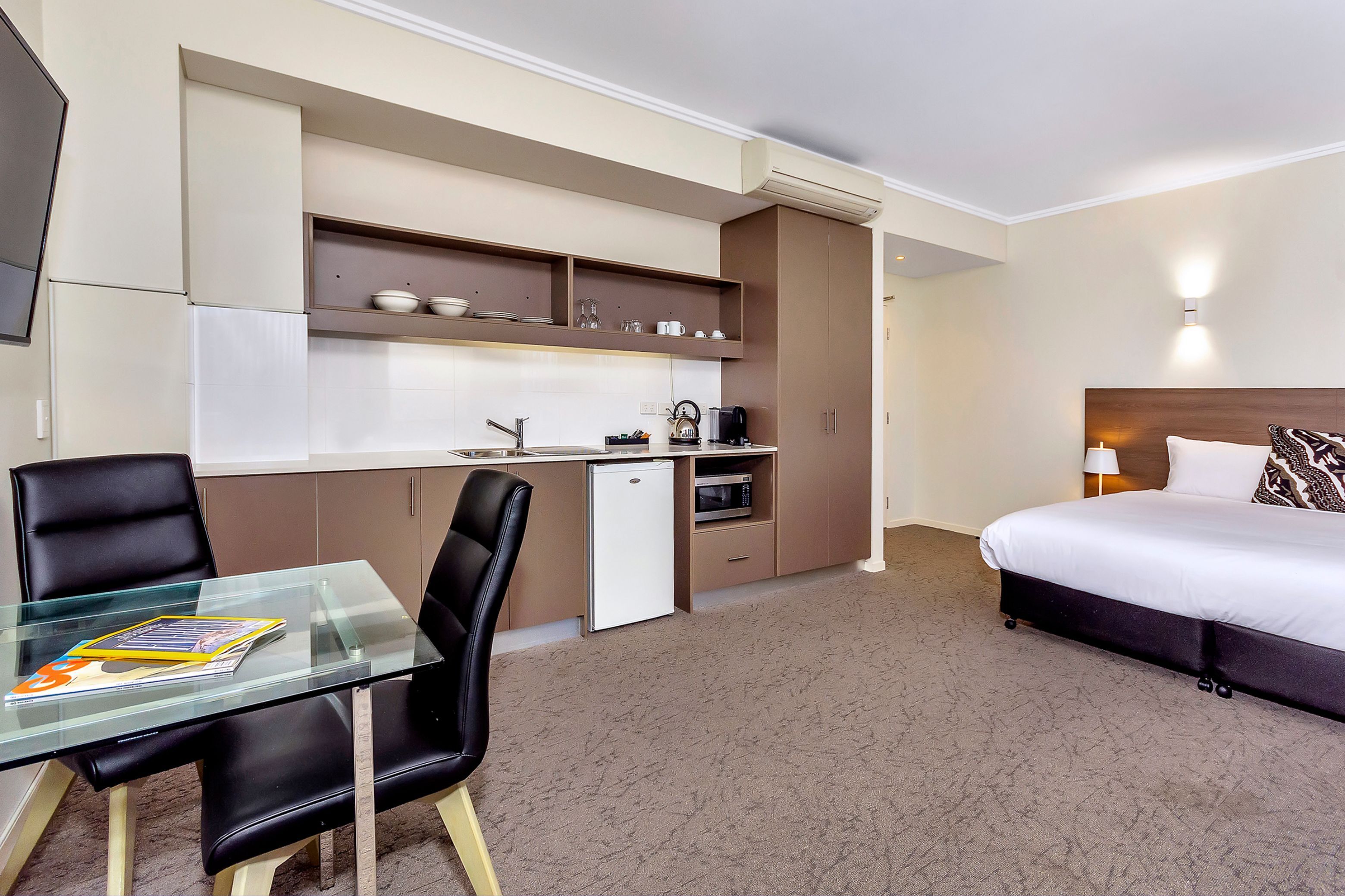 new haus studio | living area | 43-inch smart tv with digital channels, tv