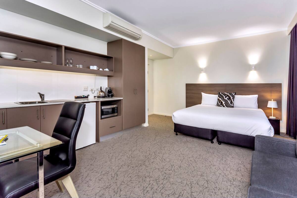 Pillow-top beds, desk, laptop workspace, blackout curtains