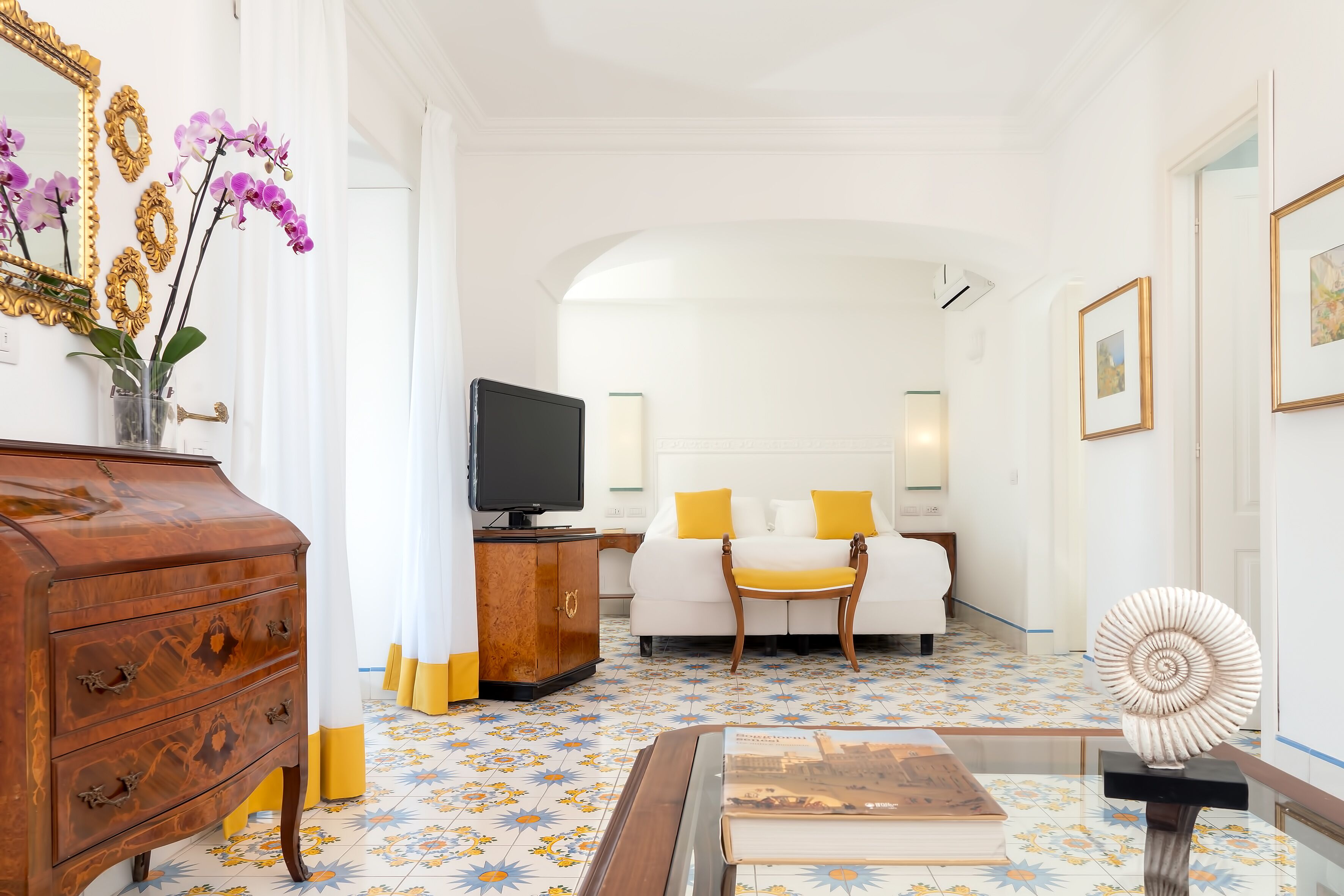 junior suite, 1 double bed, balcony, sea view | living area | 32-inch lcd tv with digital channels, tv