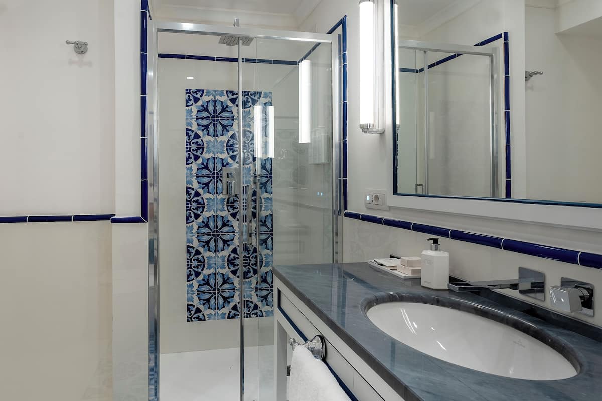 hair dryer, bathrobes, slippers, bidet