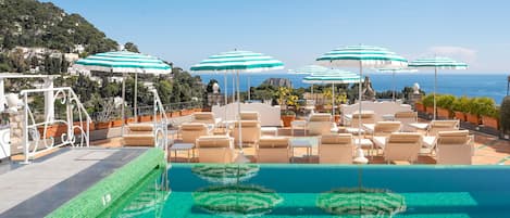 Seasonal outdoor pool, pool umbrellas, sun loungers