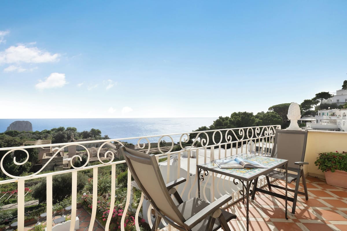 Junior Suite, Balcony, Sea View | Minibar, in-room safe, desk, free WiFi