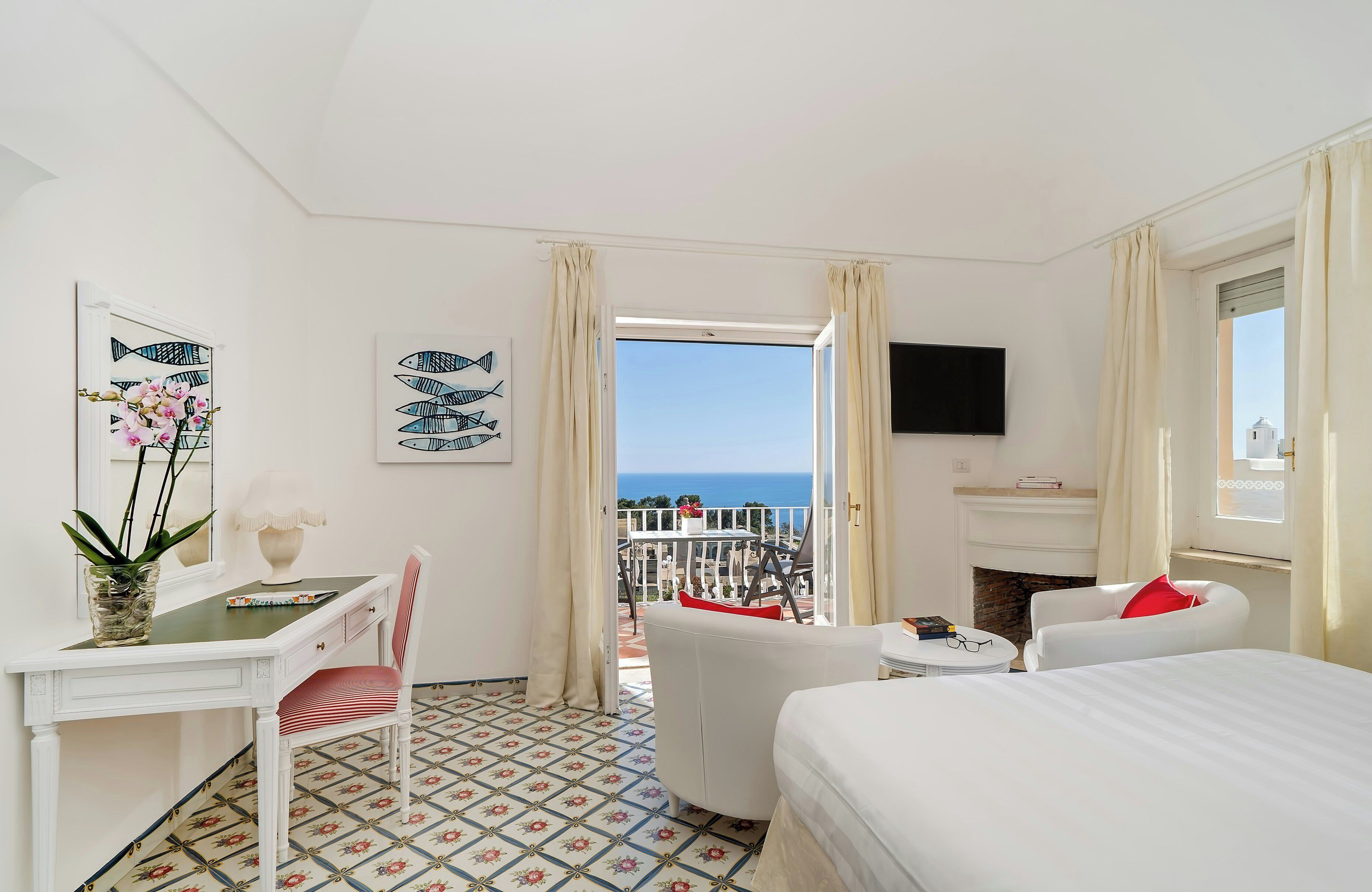 Junior Suite, Sea View | Minibar, in-room safe, desk, free WiFi