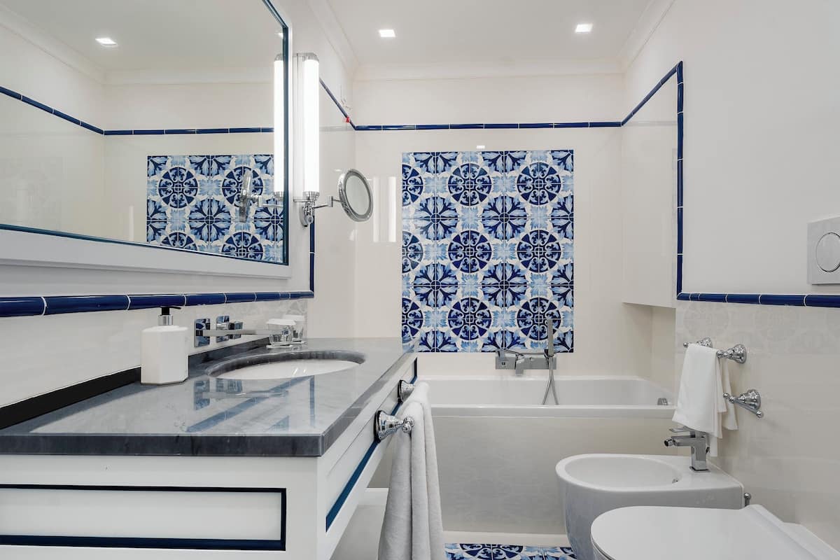 hair dryer, bathrobes, slippers, bidet