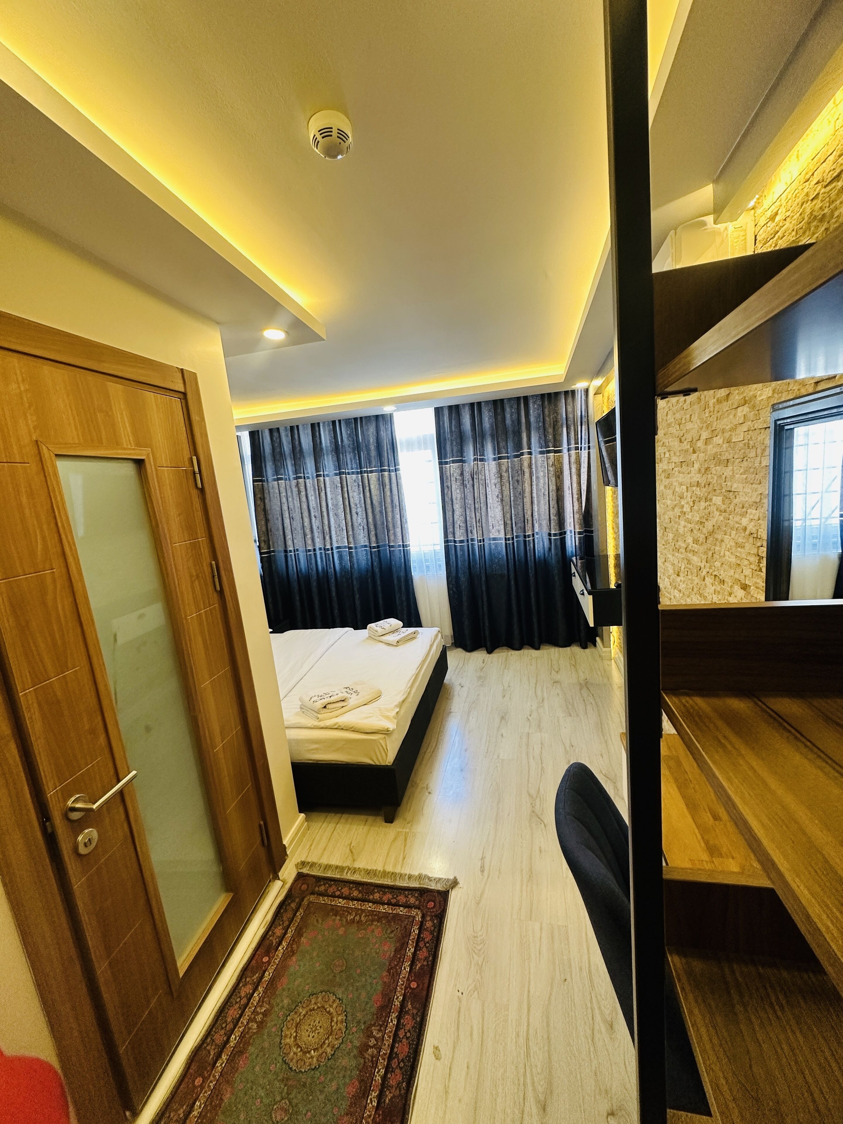 Hypoallergeen beddengoed, een minibar, een kluis op de kamer