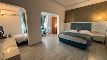 Deluxe Room With City View | Premium bedding, minibar, in-room safe, laptop workspace