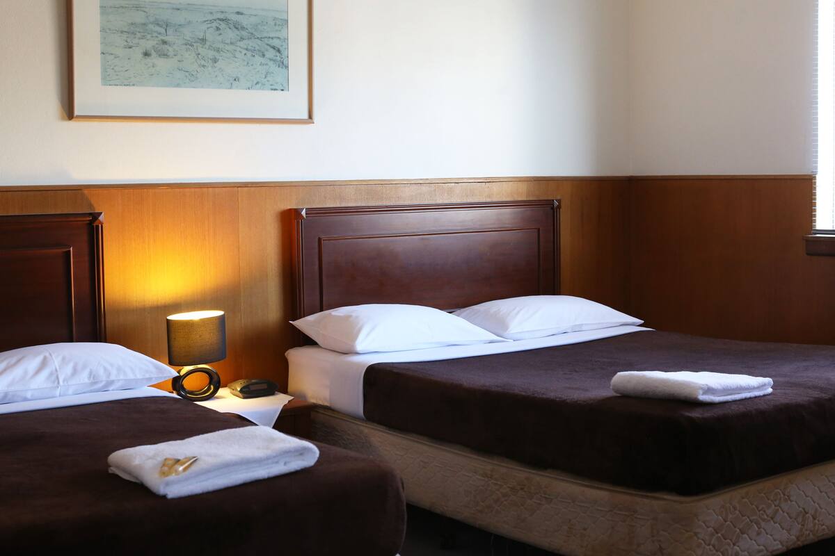 Quadruple Room | Desk, iron/ironing board (on request), cribs (free), WiFi (surcharge)