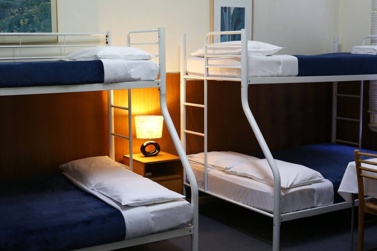 Bunk Room | Desk, iron/ironing board (on request), cribs (free), WiFi (surcharge)