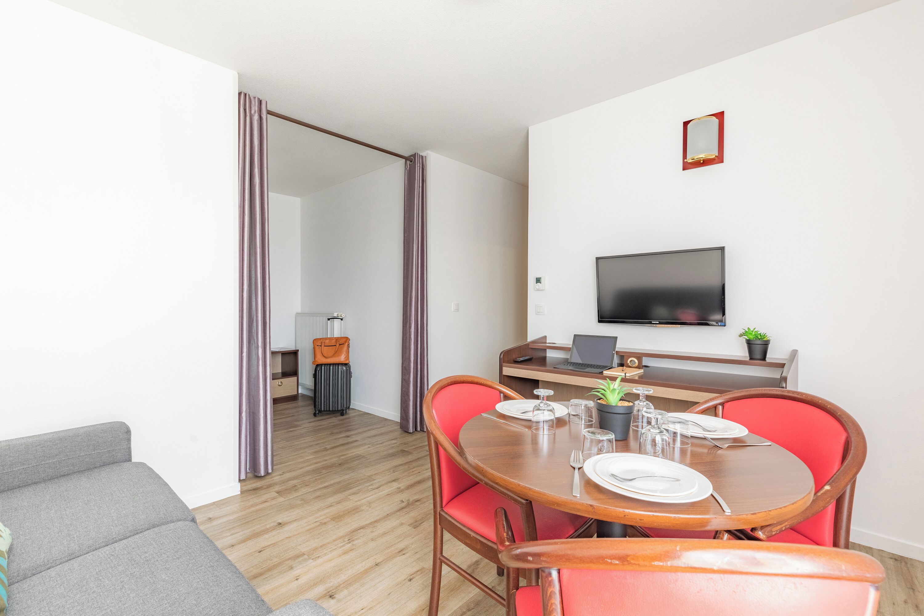 Apartment, 1 Bedroom | Living area | LCD TV