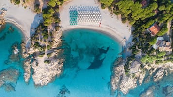 Beach nearby, white sand, sun loungers, beach umbrellas