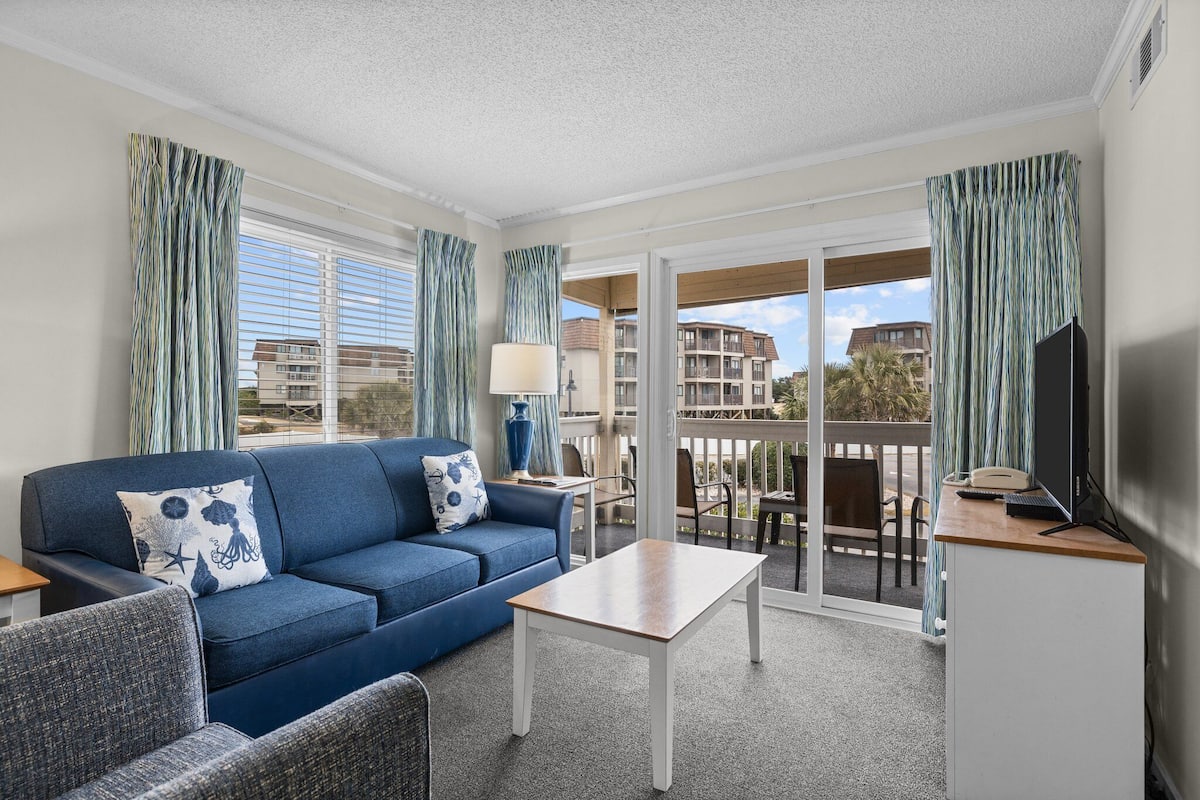 Condo, 2 Bedrooms | Living room | Flat-screen TV