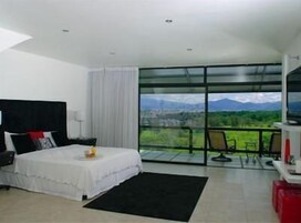 Master Suite | In-room safe, desk, blackout drapes, iron/ironing board