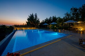 Indoor pool, outdoor pool, pool umbrellas, pool loungers