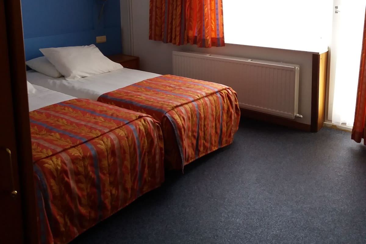 Superior Twin Room, Balcony | In-room safe, desk, free cots/infant beds, rollaway beds