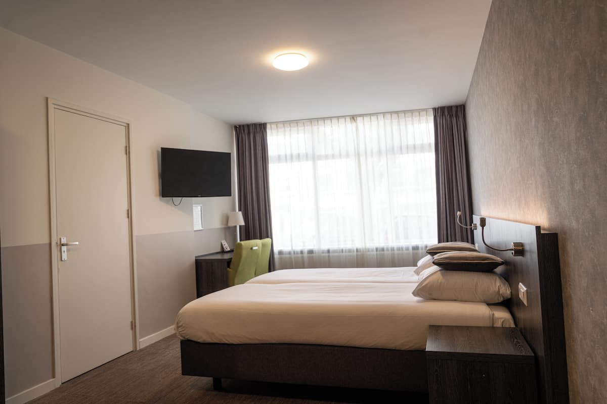 Quadruple Room | Select Comfort beds, desk, free WiFi, bed sheets