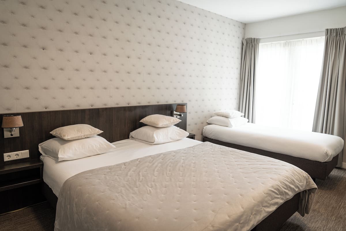 Triple Room | Select Comfort beds, blackout drapes, WiFi (free), bed sheets