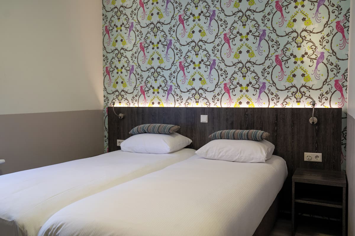 Twin Room | Select Comfort beds, blackout drapes, WiFi (free), bed sheets