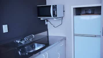 Suite ejecutiva, 1 habitación, bañera de hidromasaje | 1 dormitorio, ropa de cama de alta calidad, escritorio