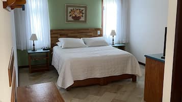 Deluxe Triple Room | Pillowtop beds, minibar, in-room safe, free cribs/infant beds