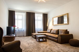 Luxury Apartment, 1 Bedroom | Living room | Flat-screen TV