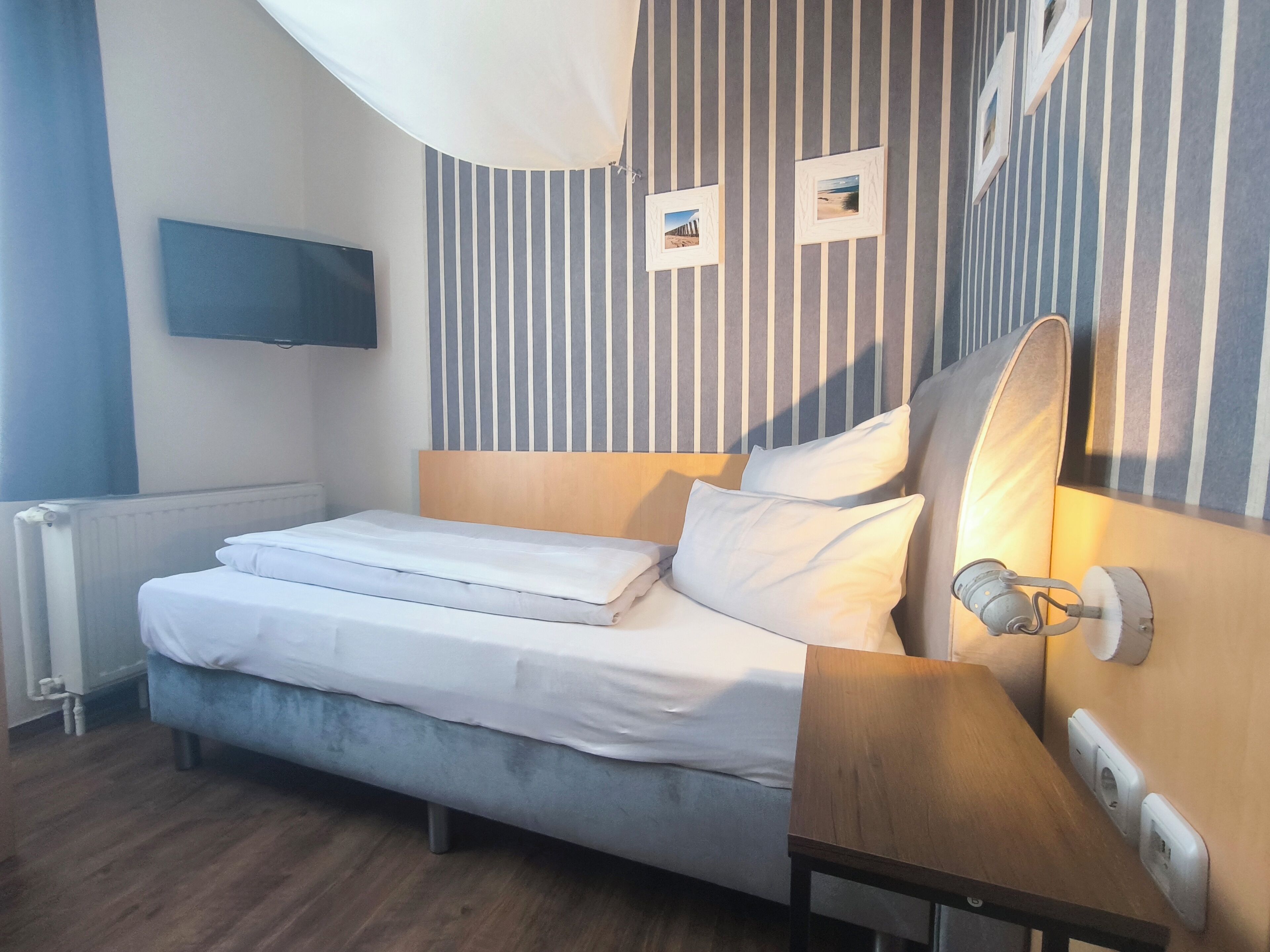 Habitación individual | Caja de seguridad en la habitación, insonorización y wifi gratis 