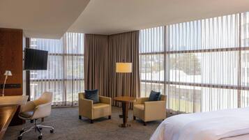 Suite junior, 1 cama King size, para no fumadores, en esquina | 1 habitación, ropa de cama de alta calidad y camas con pillow-top