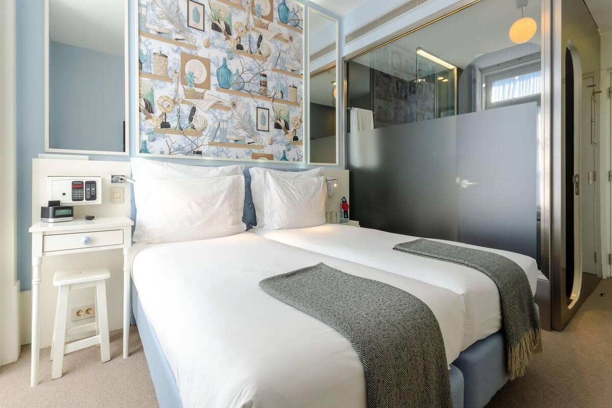 Luxe beddengoed, donsdekens, een minibar, een kluis op de kamer