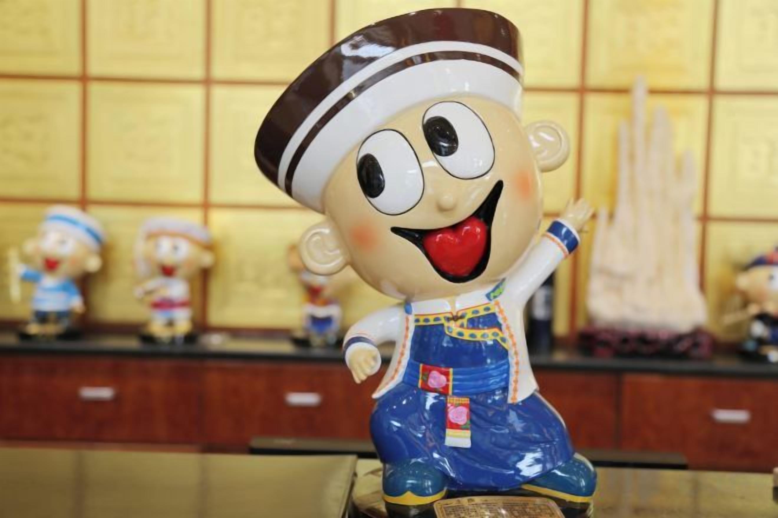 A figurine of a character in a chef's outfit on a display stand.