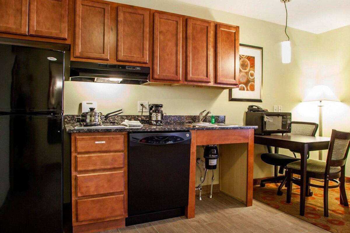 pillow-top beds, desk, blackout curtains, iron/ironing board