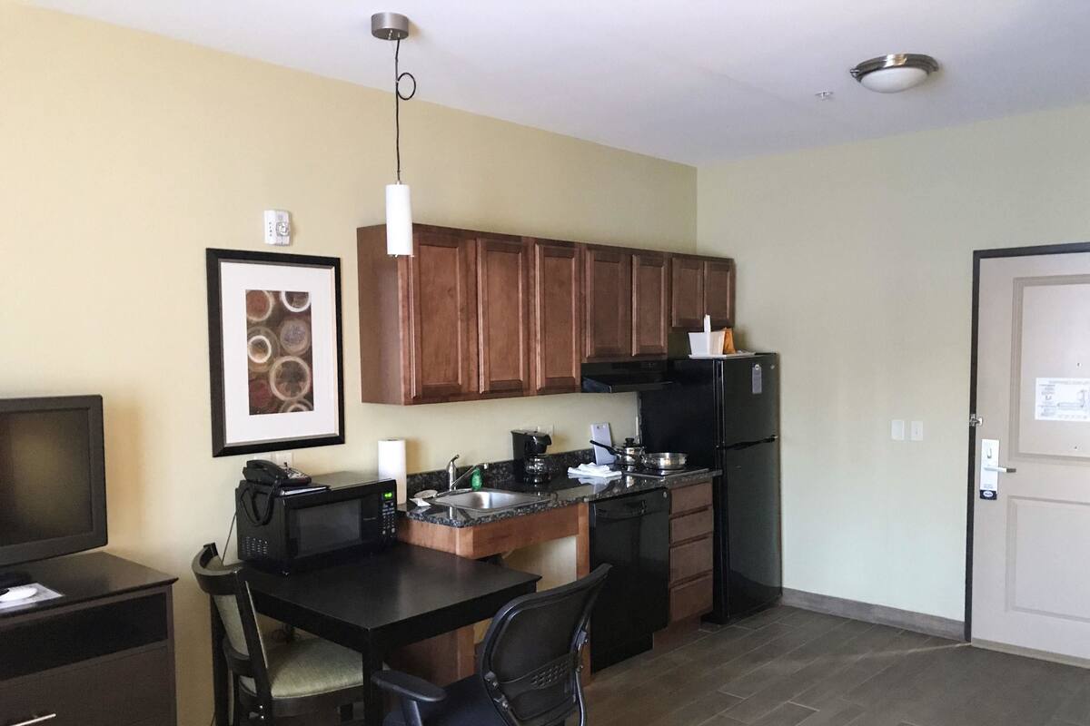 pillow-top beds, desk, blackout curtains, iron/ironing board