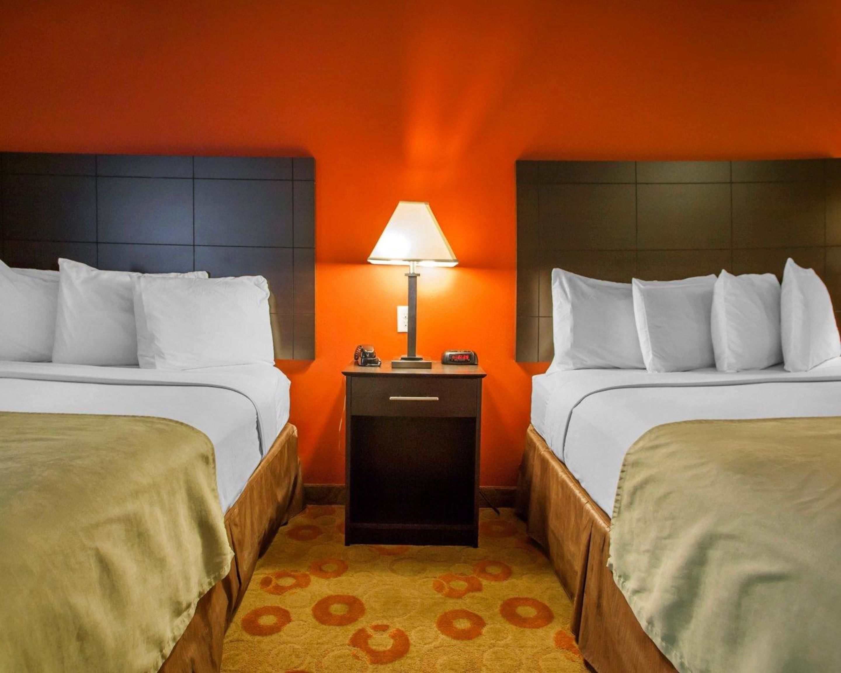 pillow-top beds, desk, blackout curtains, iron/ironing board