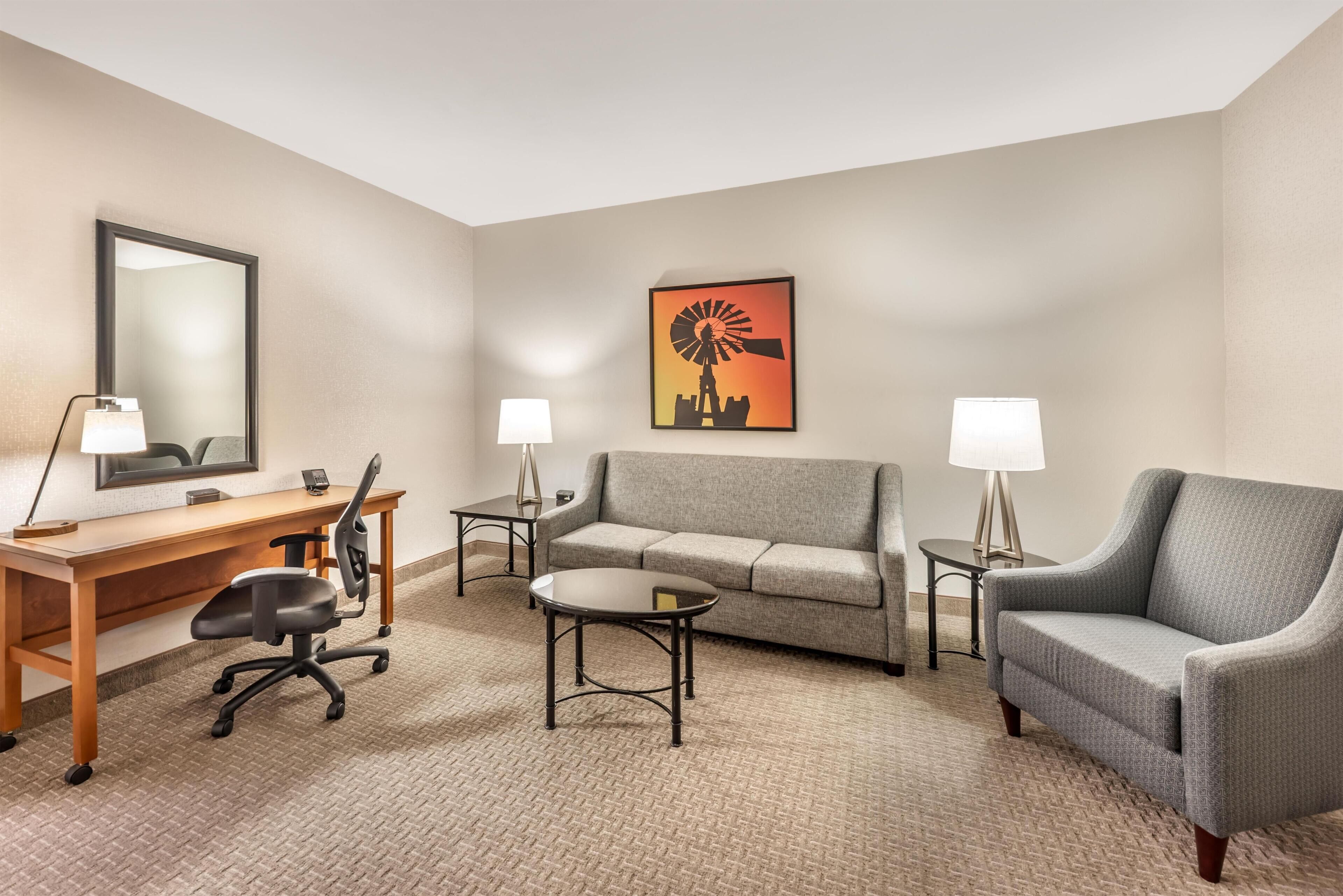 Desk, blackout drapes, iron/ironing board, free cribs/infant beds