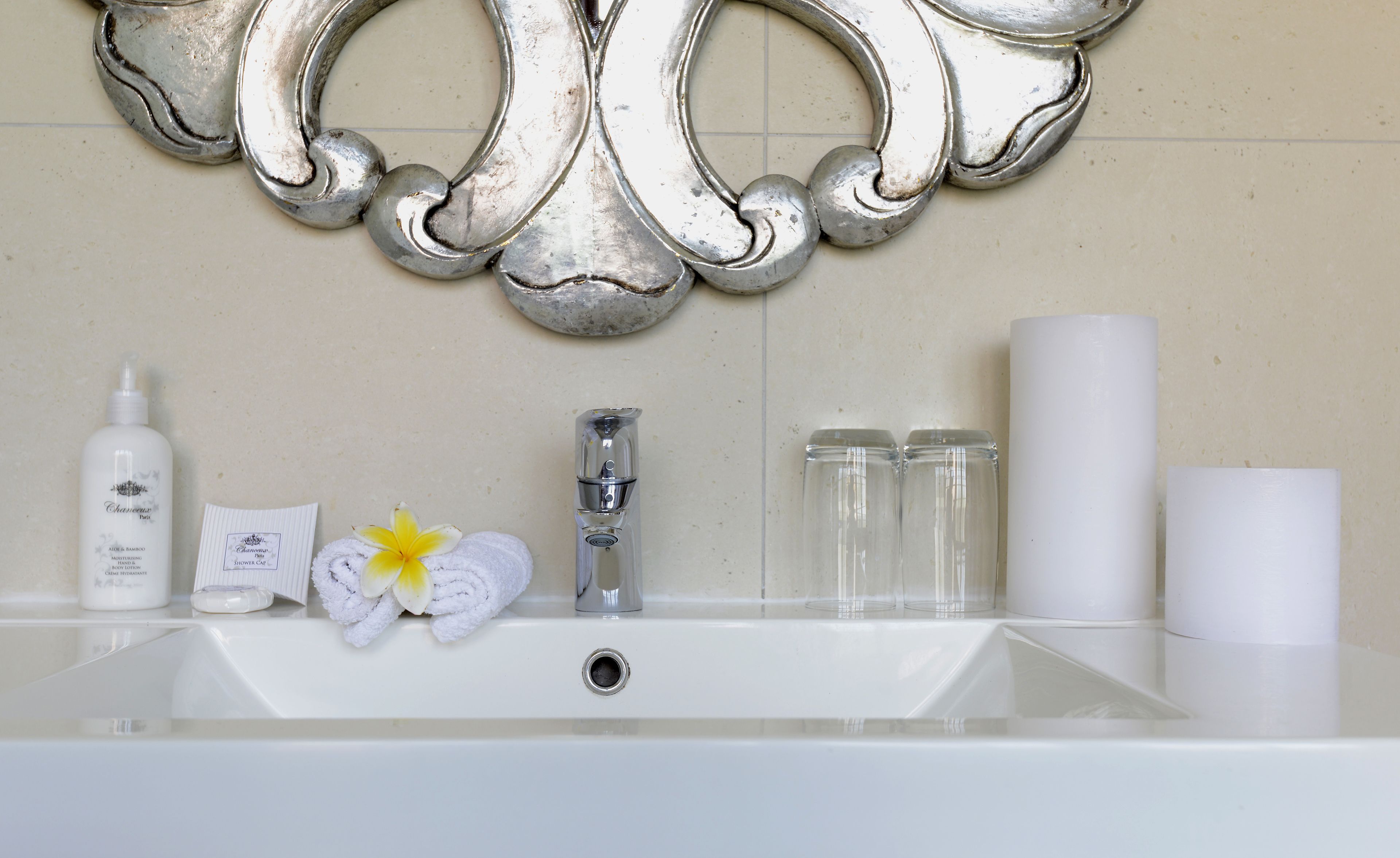 rainfall showerhead, designer toiletries, hair dryer, towels