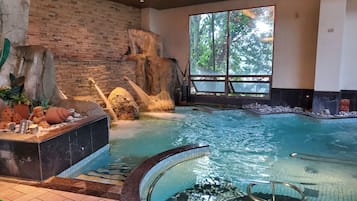 Indoor pool, sun loungers